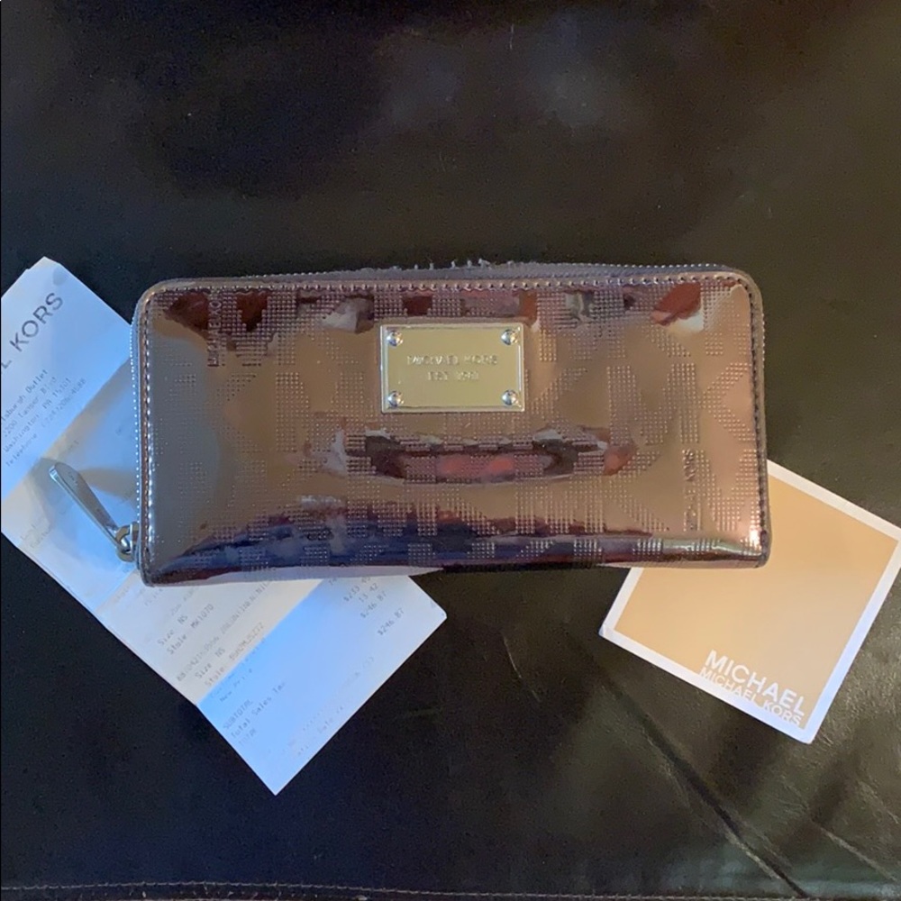 Authentic Michael Kors wallet in nickel
